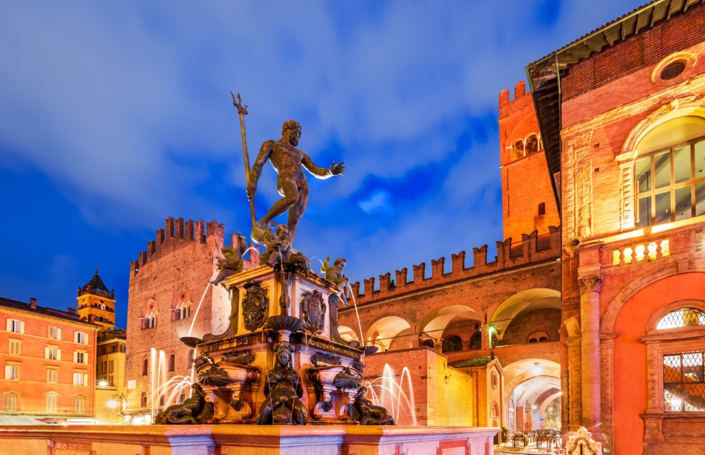 Bologna, Italy. Fontana del Nettuno, Palazzo Re Enzo in Piazza Maggiore, Italy landmark in Emilia-Romagna historical province.