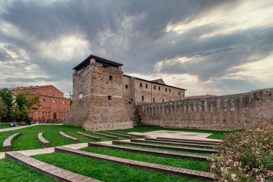 The ancient Castel Sismondo in the historic center of Rimini, Italy, under a dramatic sky