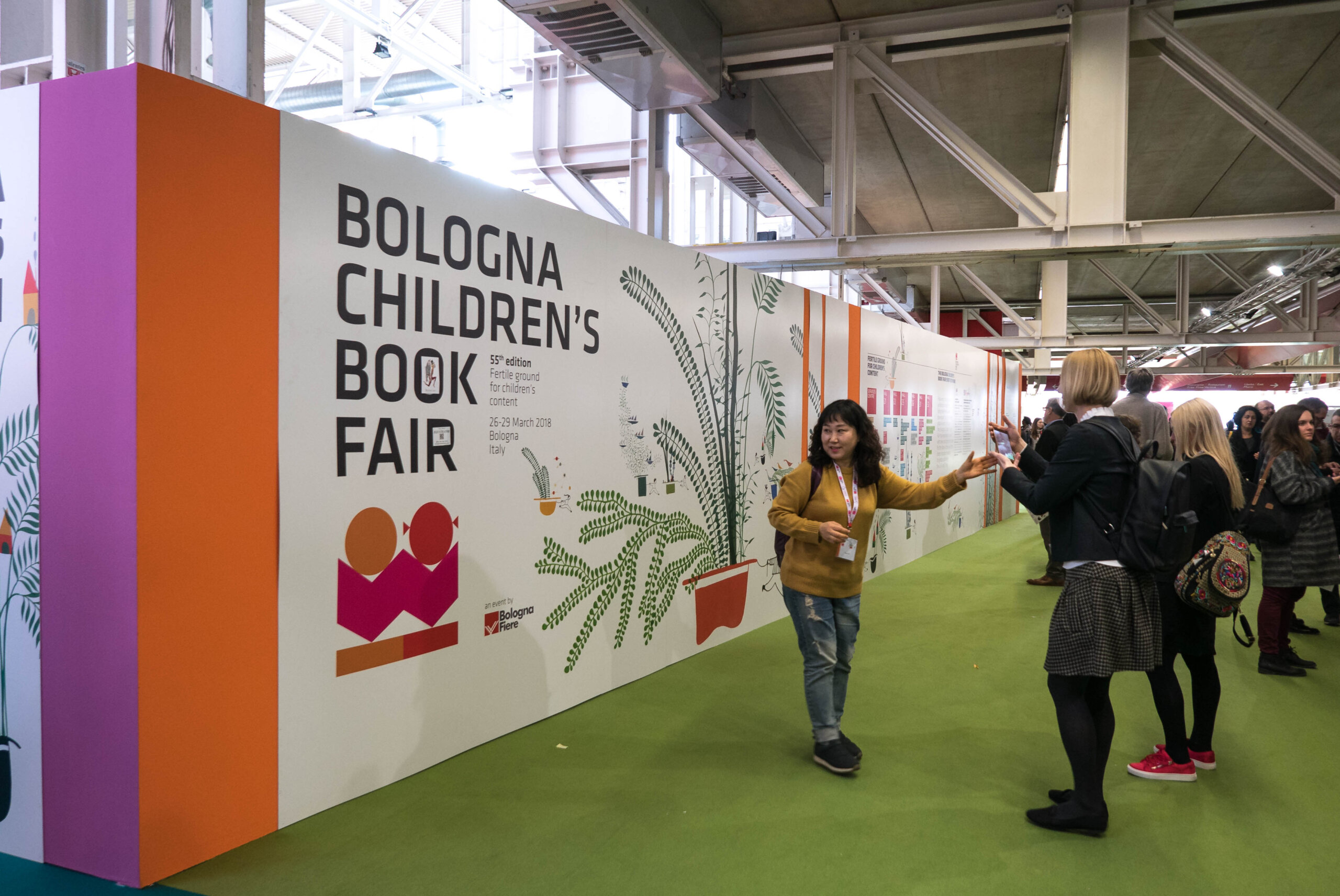 BOLOGNA, ITALY - MARCH 26, 2018: People visiting Bologna Children's Book Fair exhibition, one of the largest illustration sector trade show in Italy with 26,700 visitors in 2017.