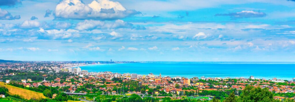 Riviera Romagnola, Panoramic view of Romagna coast or Riviera Romagnola, famous beach in Adriatic sea. Cattolica Riccione Italy.